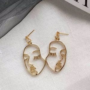 🎉 New Gold plated face silhouette stud earrings